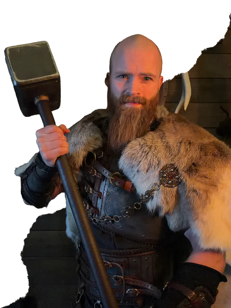 Tank from Tank's Training Grounds posing with a viking hammer
